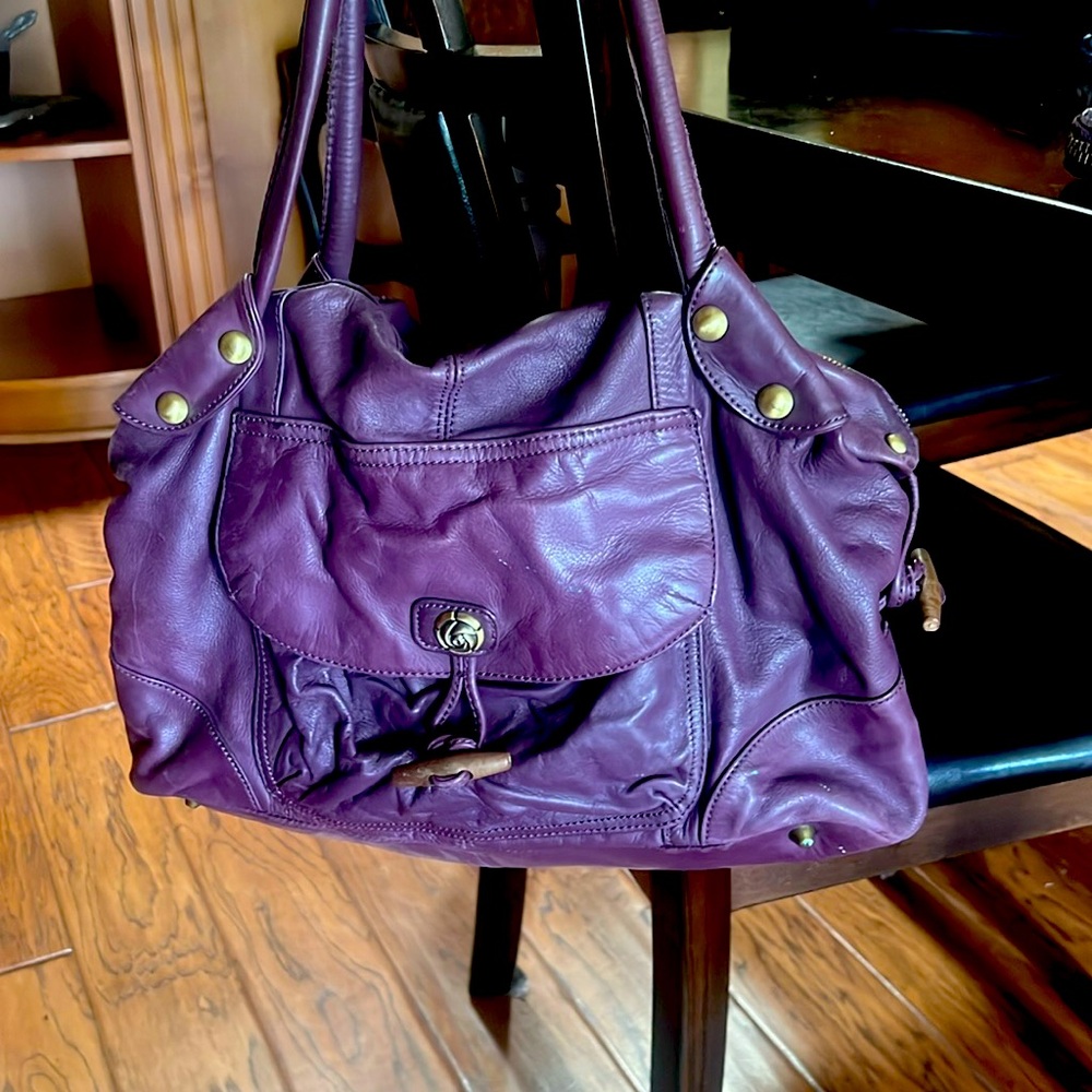 Beautiful Rough Roses bag and matching wallet. Dust bag included. Barely used!